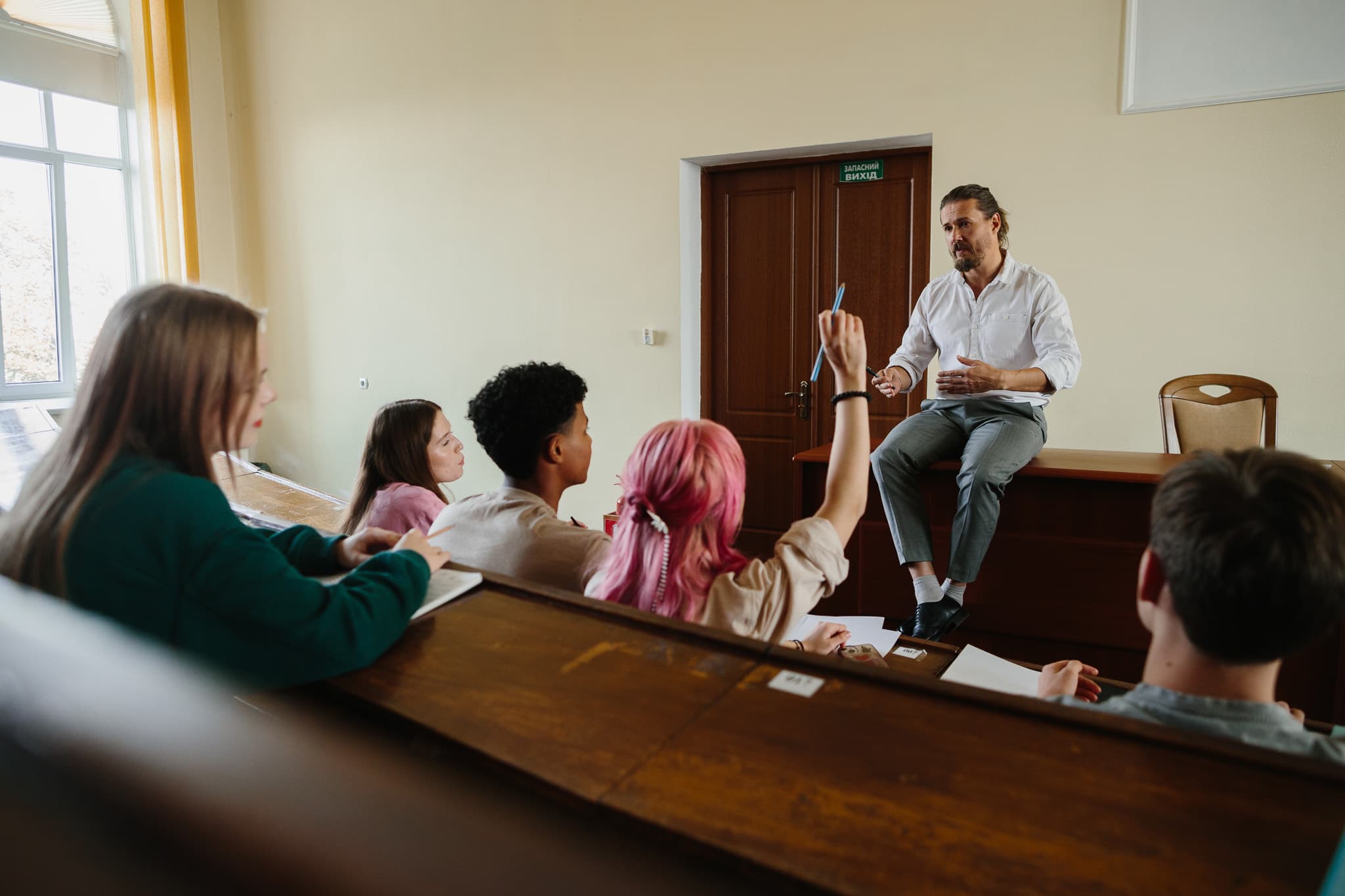 Teacher engaging with students in classroom
